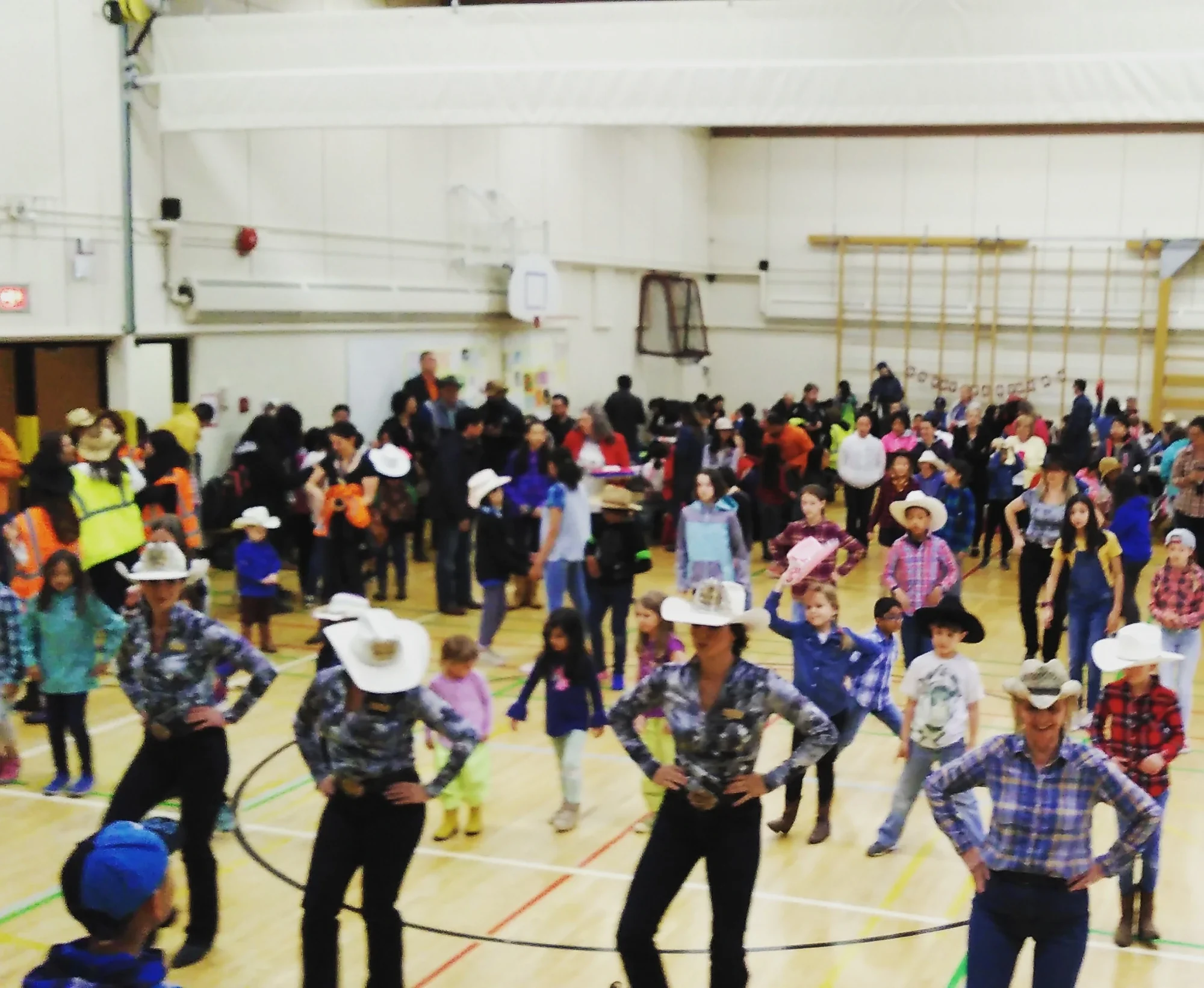 School dance event line dancing with cowboy hats — DJ Eddie Black Calgary Stampede school event