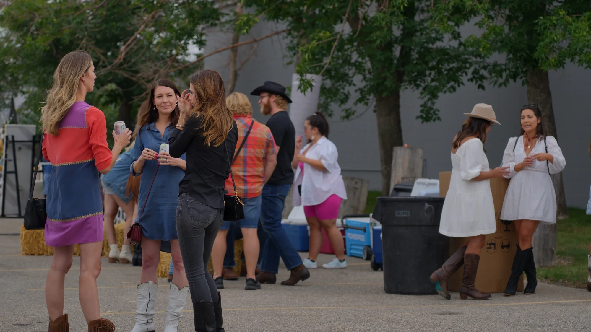 Outdoor Calgary Stampede party with DJ Eddie Black — guests in western wear